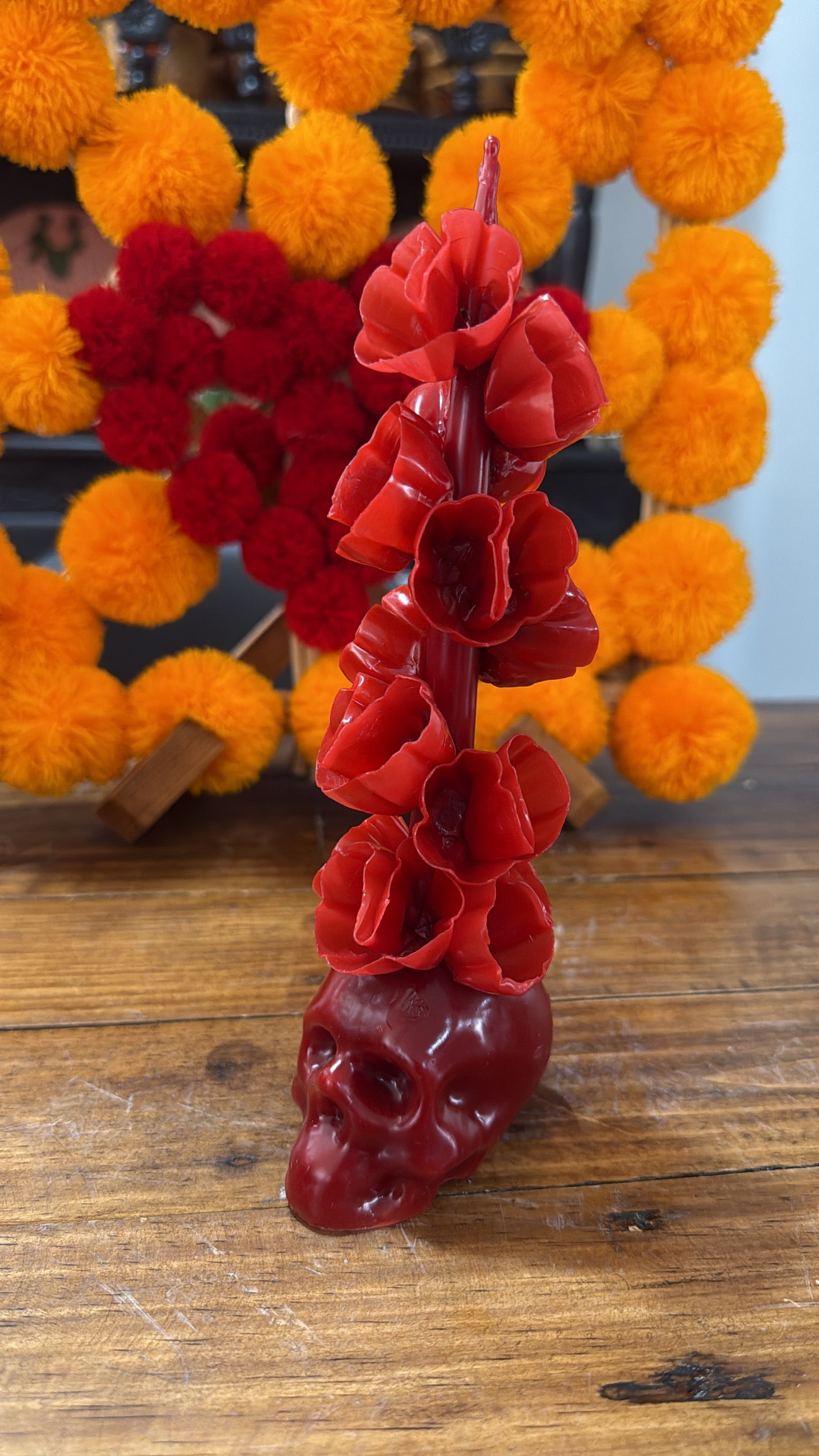 Vela roja de cráneo noche de ánimas
