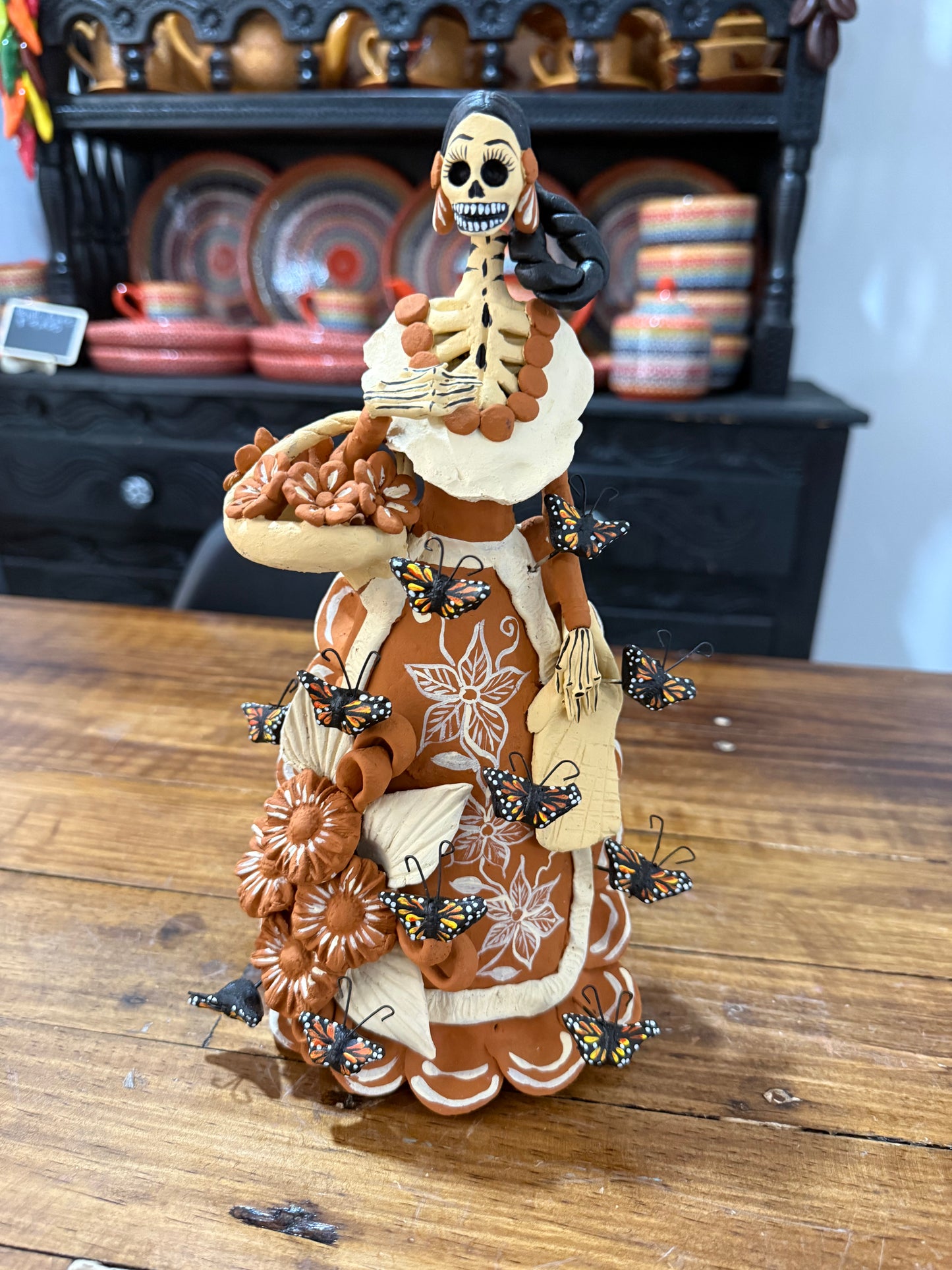 Catrina canasta de flores noche de ánimas