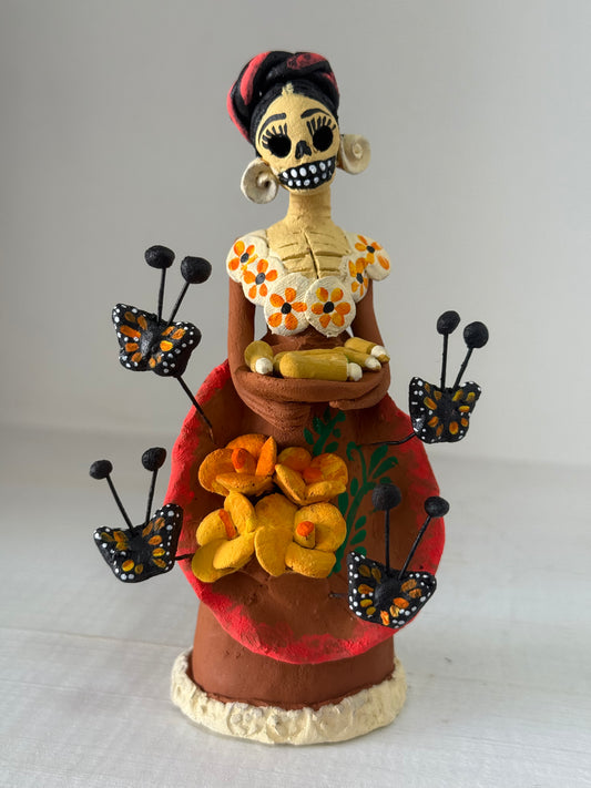 Catrina miniatura con piernas de pollo noche de muertos