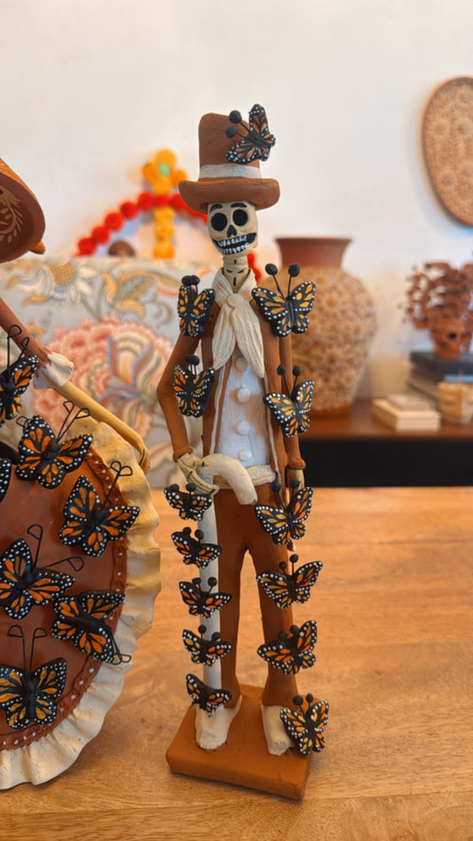 Catrín bastón y mariposas noche de ánimas