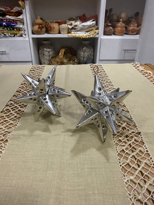 Par de estrellas de latón