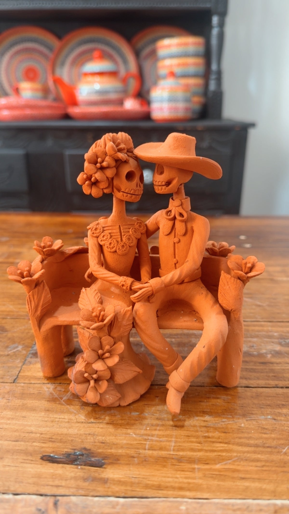 Pareja de catrines sentada con flores colección noche de ánimas amor eterno