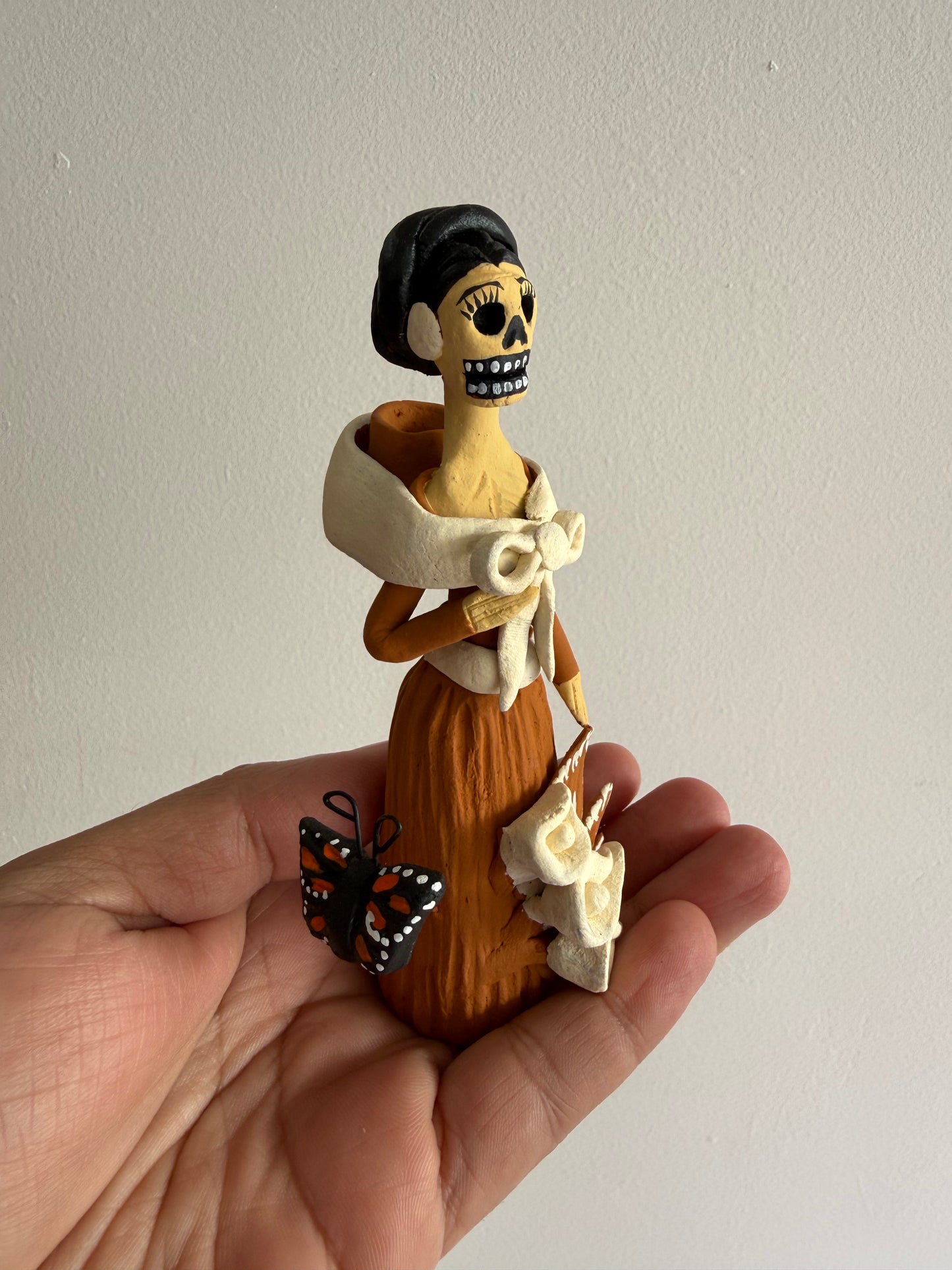 Mini Catrina natural olla en espalda  noche