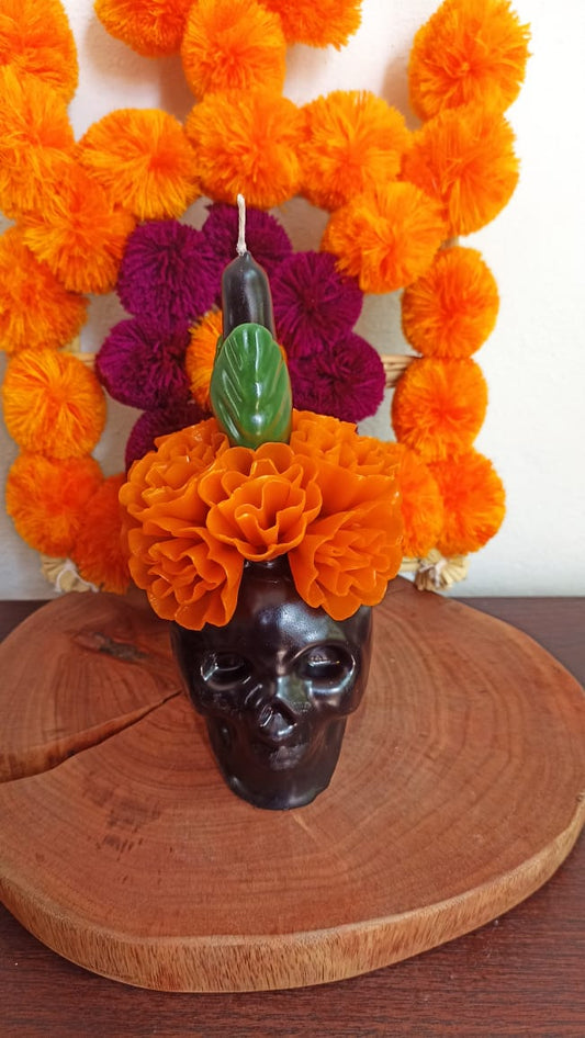 Vela de cráneo flor naranja colección día de muertos